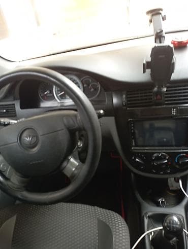 daf ati 400: Daewoo Gentra: 1.5 l | 2013 il Sedan — 6