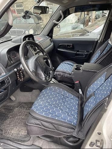 Mitsubishi Pajero: 1.8 l | 1999 il Ofrouder/SUV — 3