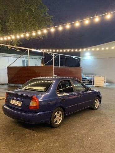 Hyundai Accent: 1.6 l | 2001 il Sedan — 5