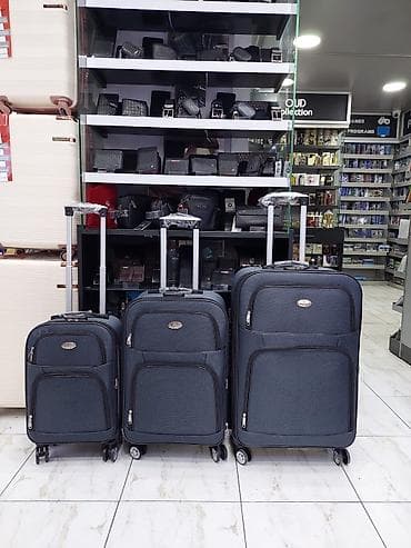 Çamadanlar: Səyahət üçün 3-lü tekstil çamadan dəsti - Rəng: tünd boz - Material — 1