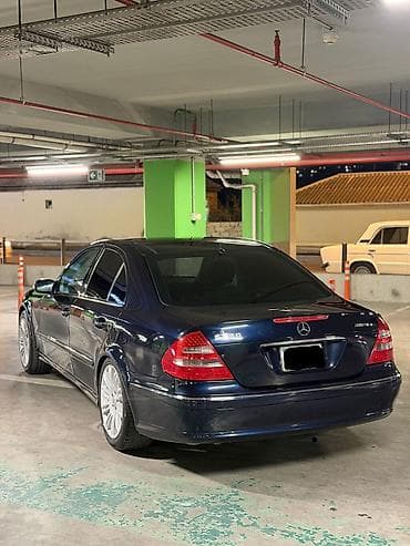07 disk: Mercedes-Benz E 320: 3.2 l | Sedan — 9