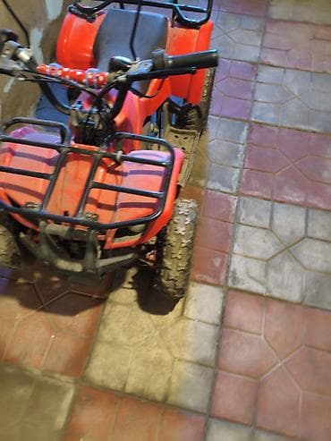 katalka uşaq motosikli: Uşaqlar üçün benzinli mini ATV/kvadrosikl Xüsusiyyətlər: - Gövdə — 2