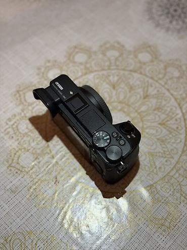foto video: Sony Alpha a6500 (ILCE-6500) güzgüsüz fotoaparat – gövdə - 24.2 MP — 3