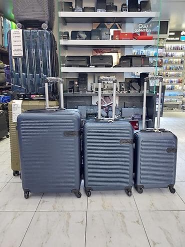 Çamadanlar: Sərnişin çamadan dəsti – 3 ölçü - Material: sərt korpus (yüngül və — 1