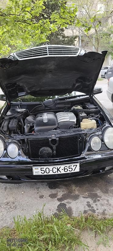 Avtomobil satışı: Mercedes-Benz E-Class (W210) sedan – qara rəng, klassik iki dairəvi — 7