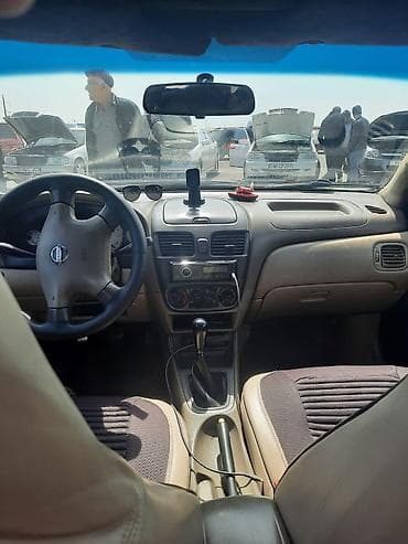 megan 3: Nissan Sunny: 1.3 l | 2006 il Sedan — 5