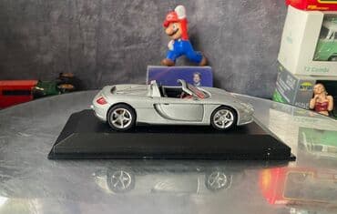 metbex tavan modelleri: Коллекционная модель Porsche Carrera GT Cabriolet type 980 silver — 12