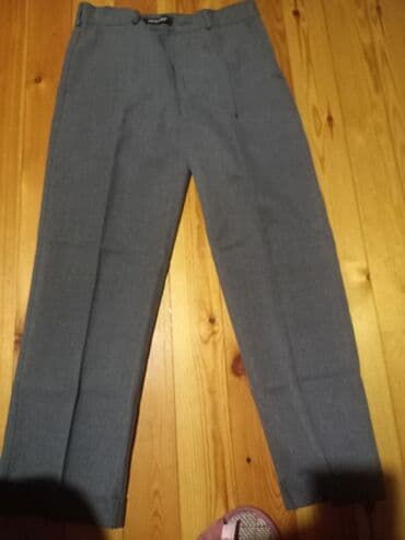 Boz rengde mektebli salvari yeniden secilmir az geyilib 10-11 yaş