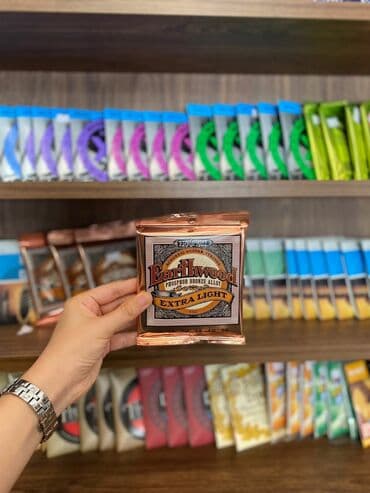 ucuz gitaralar: Ernie Ball akustik gitara simi Çatdırılma xidmətimiz mövcuddur — 1