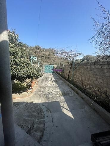emircanda evler: Suraxanı rayonu, Əmircan qəsəbəsinin mərkəzində yerləşən həyət evi — 1