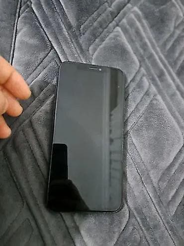 iphon xr: IPhone Xs, 64 GB, Qara, Face ID — 2