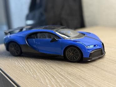 pultlu mawin: Məhsul: Radiouidarəolunan (RC) idman avtomobili modeli – mavi/qara — 1