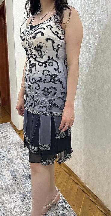 razrezli don: El ishlemesi 700 m alinib 36-40 olcu
Uzeri biserle ishlemedir — 3