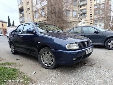 volkswagen polo 1: Volkswagen Polo sedan, tünd mavi rəng. - Yanacaq: benzin - Ötürmə — 8