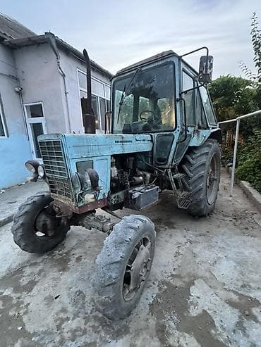 toy guzgusu: Məhsul: Təkərli kənd təsərrüfatı traktoru və asqılı kotan — 2