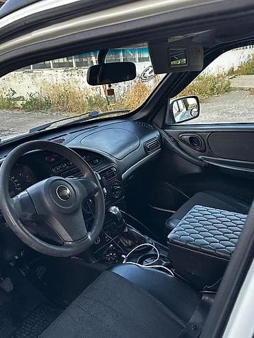 ravon r4 lizing: Chevrolet Niva – kompakt və çevik 4x4 krossover - Kuzov: ağ rəng, tam — 6