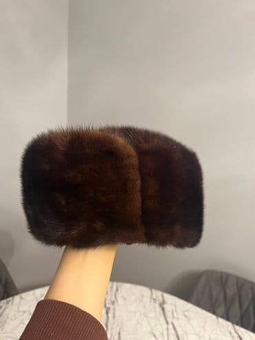 Az işlənmiş kişi üçün norka papaq