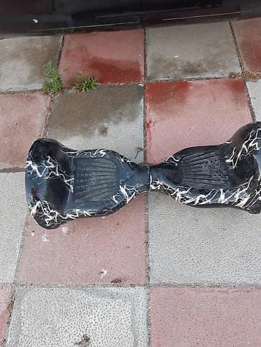 Elektrik nəqliyyatı: Özünü tarazlayan elektrikli skuter (hoverboard) - Korpus: qara əsas — 2