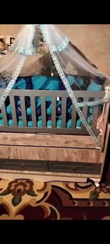 besiy: Oğlan və qız üçün, Beşik, Dəst ilə, Yellənmə mexanizm ilə — 1