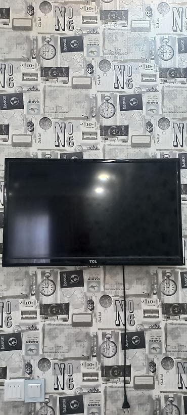 panel radiator: TCL LED televizor - Ekran ölçüsü: təxminən 32–40 düym aralığı (divara — 1