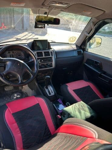 yağış sensoru: Mitsubishi Pajero iO (qısa kuzov), ağ rəng - 4WD “Super Select” tam — 5