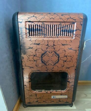 qızdırıcı konvektor: Qəhvəyi və qara rənglərdə dizayn edilmiş portativ qaz sobası. Kompakt — 2