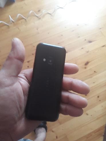 prastoy telfon: Model: nokia (düyməli telefon) Xüsusiyyətlər: - Korpus: kompak, qara — 2