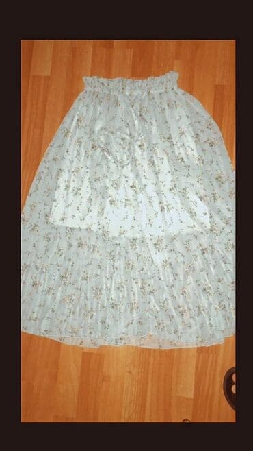 трикотажные юбки для девочек: Qadın ətək paketi – 2 ədəd Hərəsi 10 manat. 1) Ağ çiçəkli, ətək: - — 1