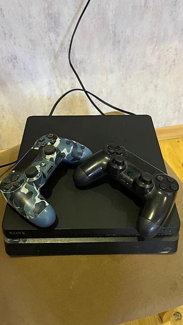 Playstation 4 1 tb ideal veziyyetdedir icinde oyunlar var 2 arginal — 1