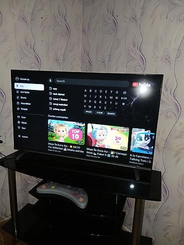 Smart TV + şüşə TV stendi - Təxminən 40–43 düym diaqonallı plazma/LCD — 1