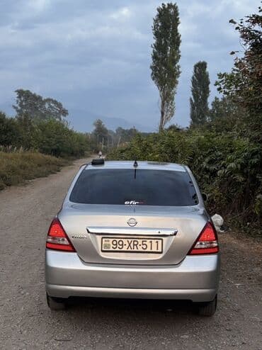 mersedes disk r15: Nissan Tiida: 1.6 l | 2006 il Sedan — 10