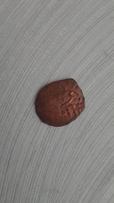 CD, DVD disklər və kassetlər: Məhsul: Köhnə mis sikkə (4 ədəd) Təsvir: - Material: mis - Say: 4 — 2