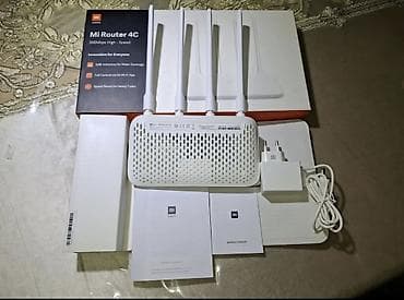 modem vifi: Xiaomi Mi Router 4C – 300 Mbps Wi‑Fi router Xüsusiyyətlər: - 2.4 GHz — 2