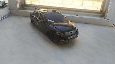 mitsubishi lancer evolution: Chevrolet Lacetti/Gentra sedanın yığma model avtomobili (miqyası — 1