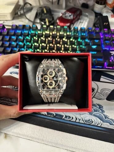 Şəffaf korpuslu kişi qol saatı - Korpus: şəffaf polikarbonat tonda