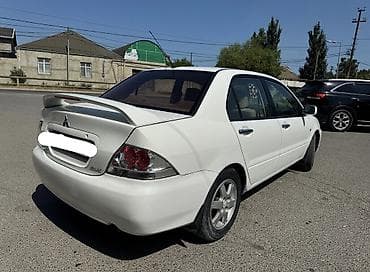 motorlar: Mitsubishi Lancer: 1.6 l | 2007 il 313000 km Sedan — 5