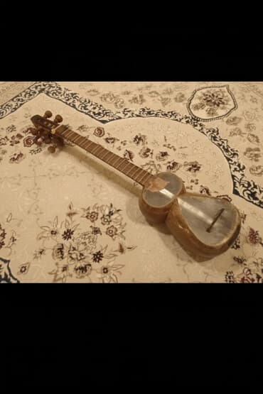 Tar – milli simli musiqi aləti - Korpus: iki kameradan ibarət, armud