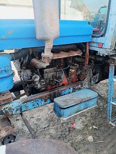 вешак для одежды: Mavi rəngli təkərli kənd təsərrüfatı traktoru. Texniki xüsusiyyət və — 3