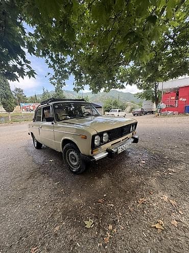 lada 012: VAZ 2106 sedan Xüsusiyyətlər: - Kuzov: 4 qapılı sedan, açıq bej rəng — 1