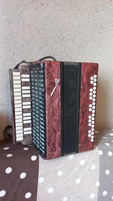 Qarmon, Akustik, İşlənmiş, Ünvandan götürmə