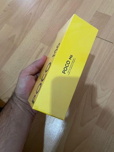 ən yaxşı lazer aparatı: Poco M6, 256 ГБ, цвет - Черный — 3