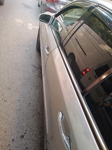 prius teker: Mercedes-Benz E-Class sedan (W211), gümüşü rəng. - Kuzov: 4 qapılı — 4