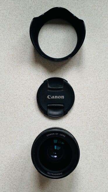 printer satisi islenmis: Canon EF 35mm f/1.4 L USM
Tam ishlek veziyetde, ciziqlari var — 4