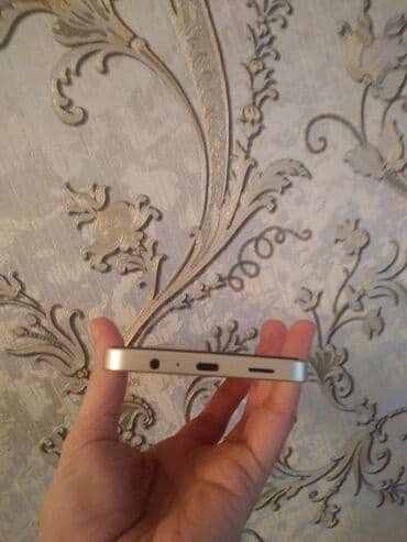 samsunq a 50: Samsung Galaxy A06, 128 GB, rəng - Qızılı, Barmaq izi — 3