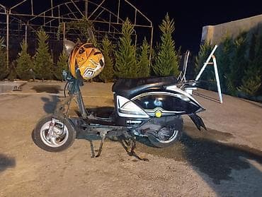 debilqe satisi: Şəhər içi rahat gediş üçün kompakt skuter/moped. Əsas xüsusiyyətlər — 6