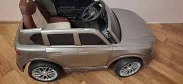 masin ucun xor xor: Uşaqlar üçün nəzərdə tutulmuş bu elektrikli minik avtomobili gümüşü — 4