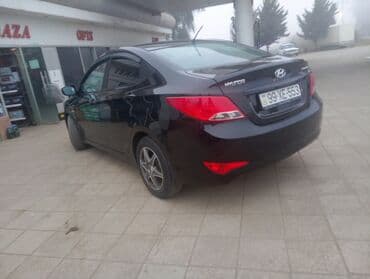 volkswagen 3 2: Hyundai Solaris sedan - Korpus: 4 qapılı sedan, qara rəng - Mühərrik — 4