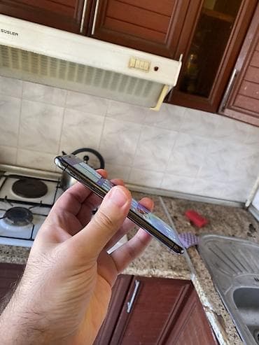 ipone x: IPhone X, 64 GB, Qara, Face ID — 9