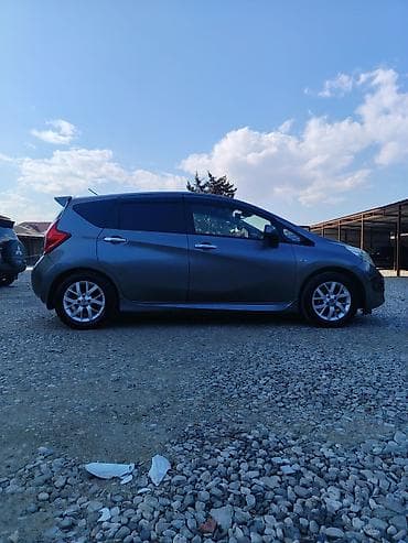 07 ucuz: Nissan Note Medalist (JDM), boz rəng, hatchback gövdə. Texniki — 9