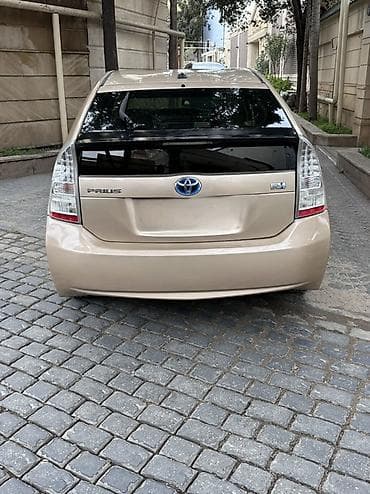 tap az prius: Toyota Prius (III nəsil) hibrid liftbek - Rəng: açıq qızılı/bej, qara — 6